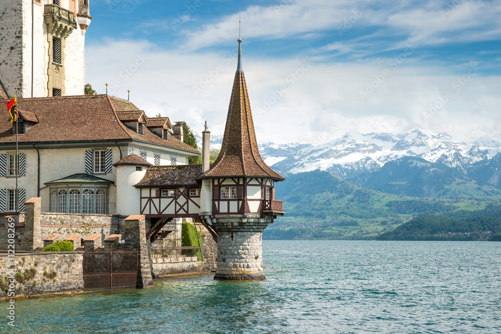 Beautiful little tower of Oberhofen castle in the Thun lake with