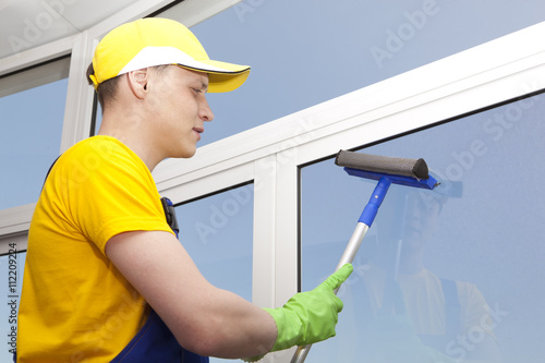 Professional cleaning washes window