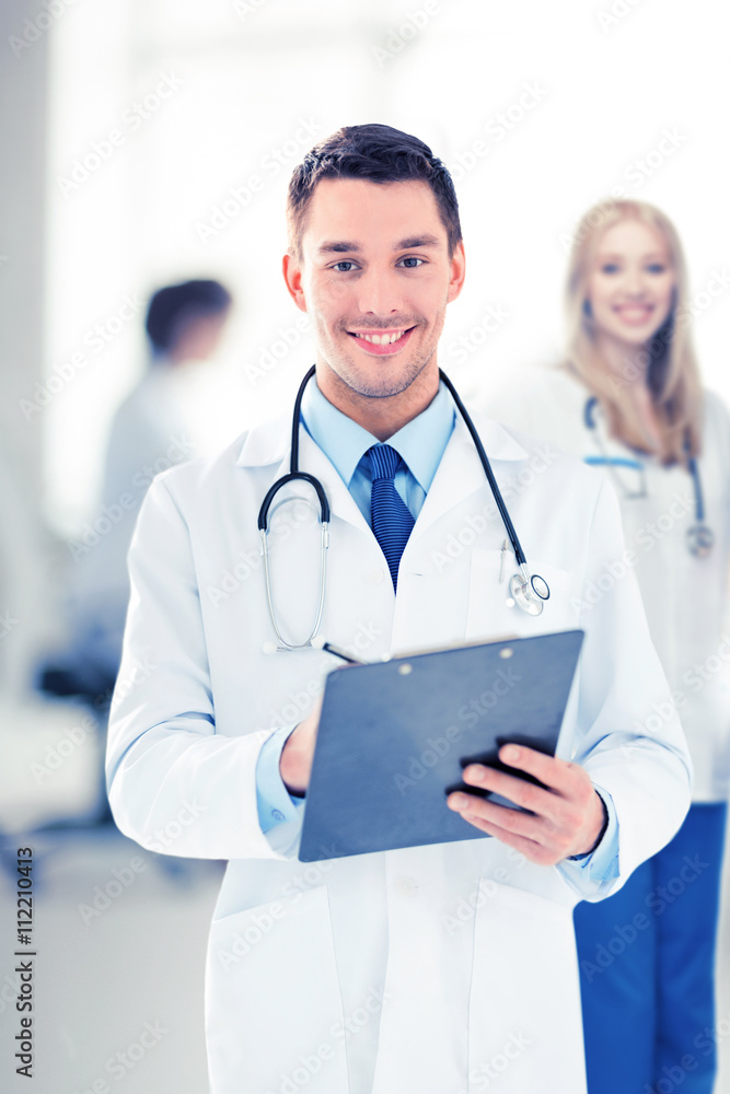 male doctor writing prescription male doctor writing prescription