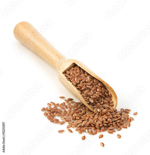 flax seeds in scoop on white