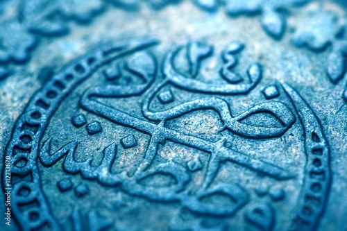 Macro picture of an ancient ottoman coin photo