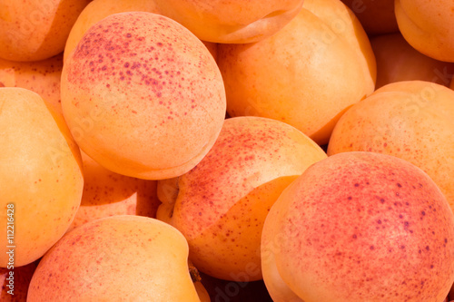 Ripe juicy apricots close up