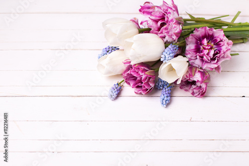 Fototapeta Naklejka Na Ścianę i Meble -  Fresh spring flowers on white wooden table.
