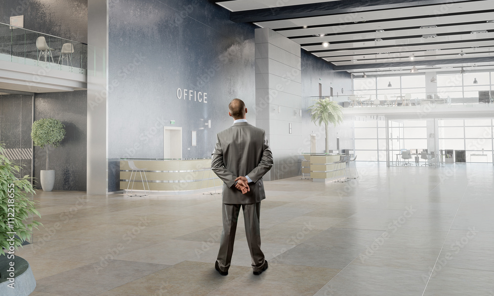 Fototapeta premium Businessman in office interior