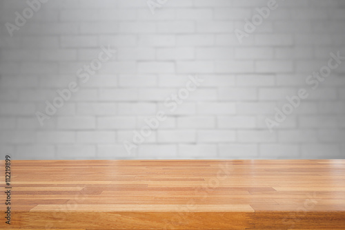 Empty table and white brick wall background