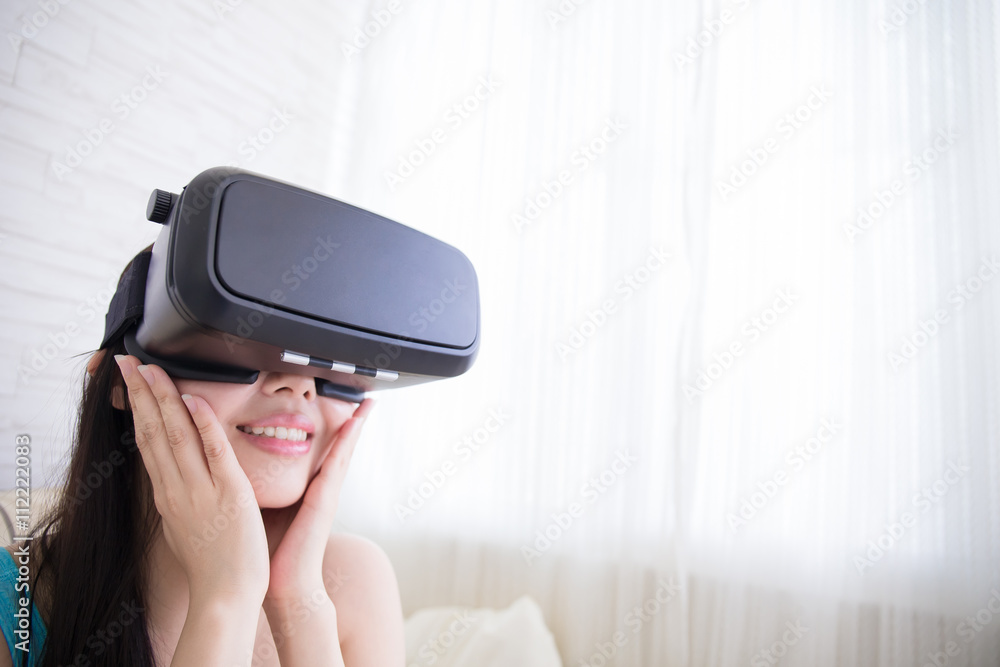 woman using VR headset glasses woman using VR headset glasses