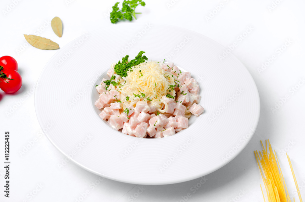 Spaghetti carbonara on a white background Spaghetti carbonara on a white background