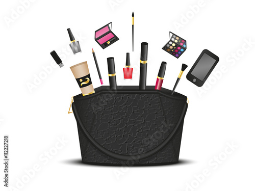 black leather bag with makeup and accessories on a white background
