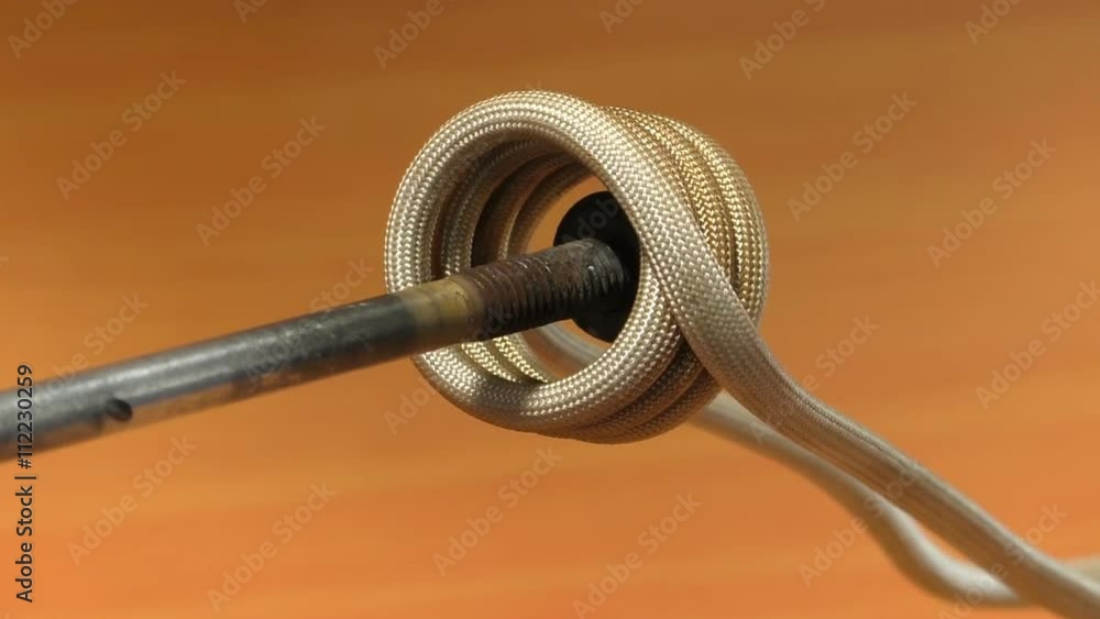 Rusty bolt with nut inserted into the induction heating coil soon