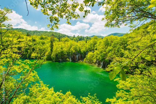  Beautiful landscape, waterfall and clear green water in the Plitvice Lakes National Park in Croatia, panoramic view