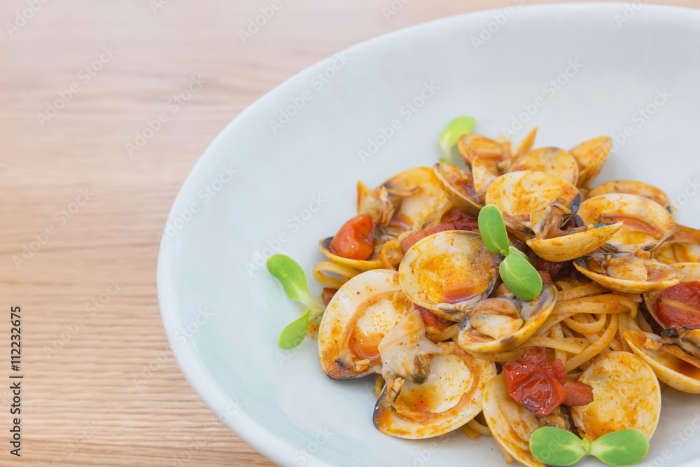 delicious dish of spicy pasta with shellfish and Sunflower sprou delicious dish of spicy pasta with shellfish and Sunflower sprou