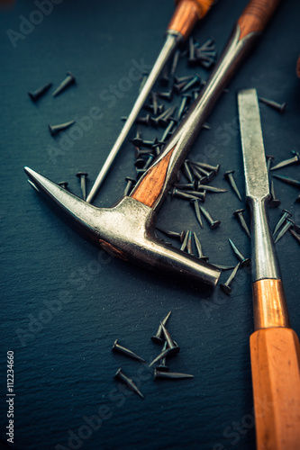 Fotografie Traditional tools of upholsterer on a table