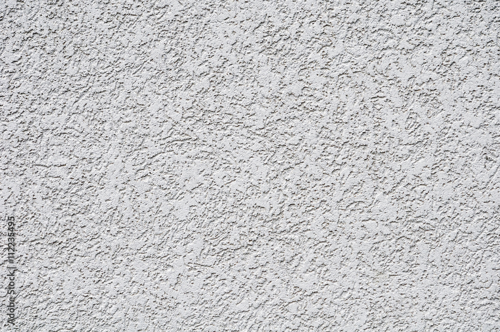 Background With White Plaster Wall With Uneven Surface Background With White Plaster Wall With Uneven Surface