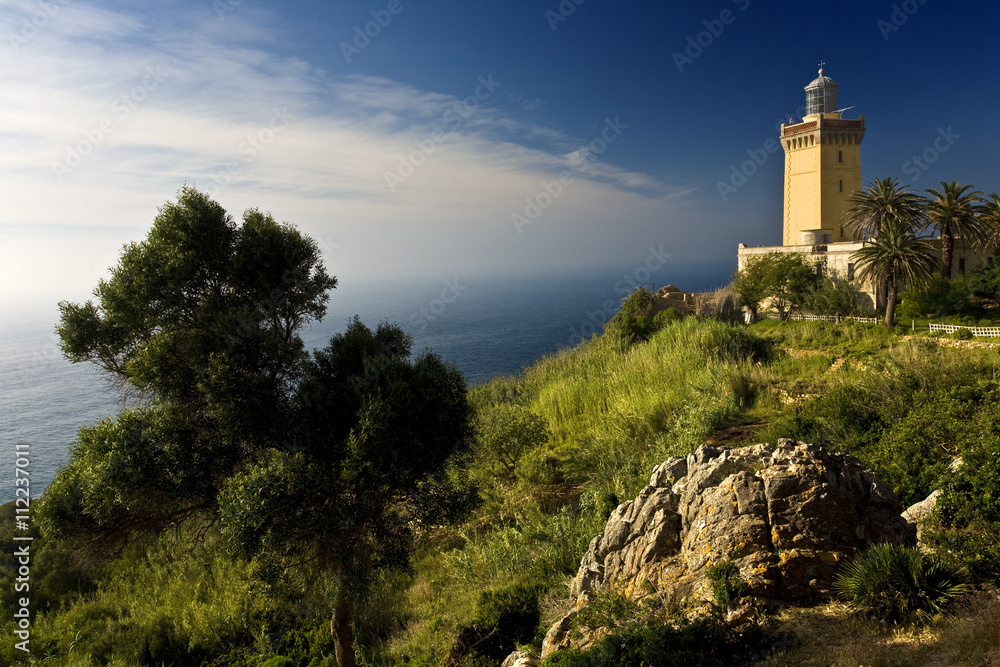 Morocco. The lighthouse at Cap Spartel (built in 1864 by Sultan Mohammed III), where meeting of the Atlantic Ocean and Mediterranean Sea and this is the most Northwestern point of Africa