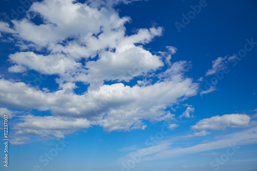 Blue summer sky with white clouds