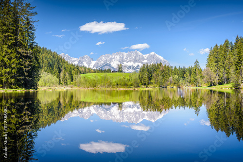 Wilder Kaiser reflecting in mountain lake, Kitzbühel, Tyrol, Austria © auergraphics