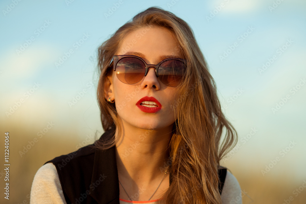Sexy girl with sunglasses.Fashionable girl with sunglasses.Beautiful