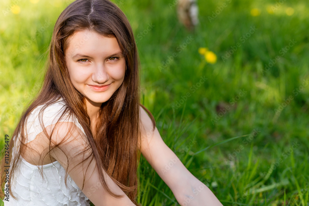 portrait of happy girl on nature in summer portrait of happy girl on nature in summer