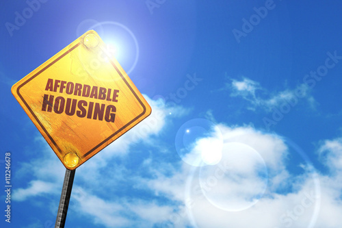 affordable housing, 3D rendering, glowing yellow traffic sign photo