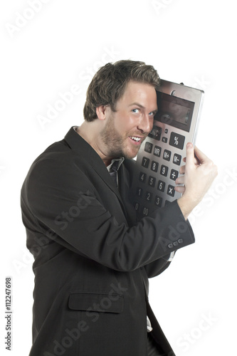 businessman holding a giant calculator photo