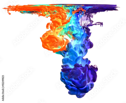 Colored ink in water creating abstract shape