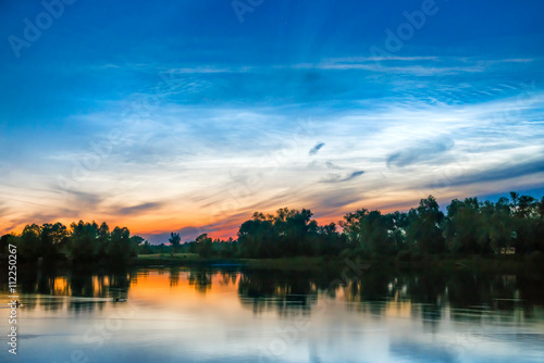 Beautiful colorful sunset on a lake