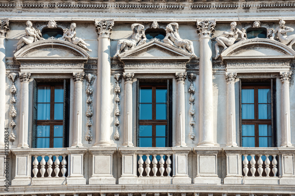 Facade of white Doge's Palace in Venice