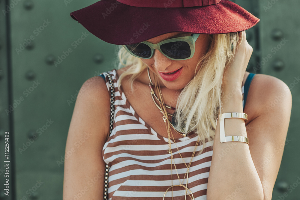 Caucasian woman in hat and sunglasses Caucasian woman in hat and sunglasses