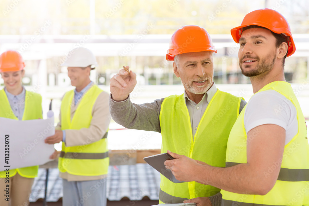 Construction workers. Project discussion Construction workers. Project discussion