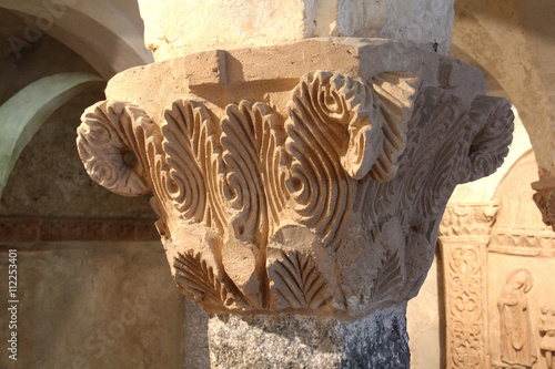 Cripta della basilica di San Pietro al Monte; Civate. capitello in stucco photo