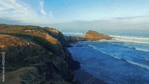 Early morning on the ocean cliffs Algarve Portugal aerial view