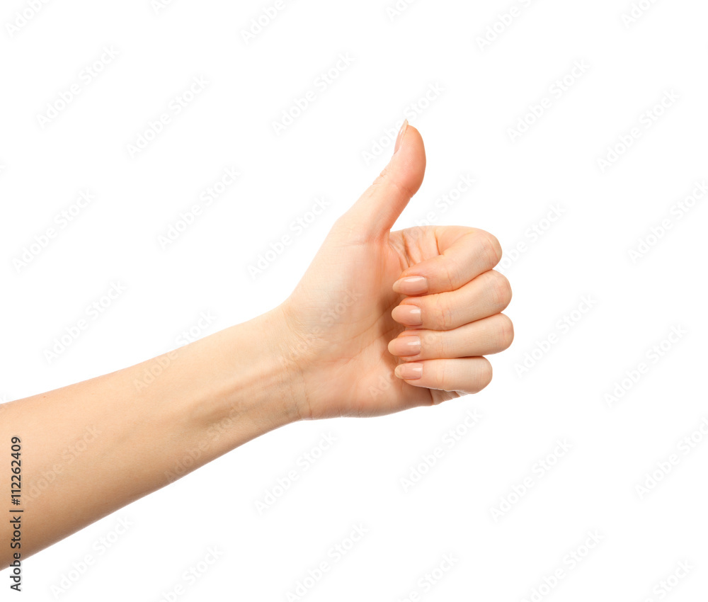 Beautiful woman hand thumb up with manucure nails Beautiful woman hand thumb up with manucure nails