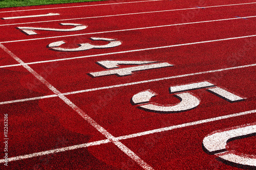 Track and Field numbered starting line.
