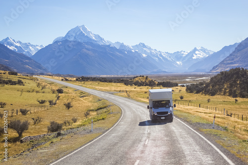 campervan on road with mountain view