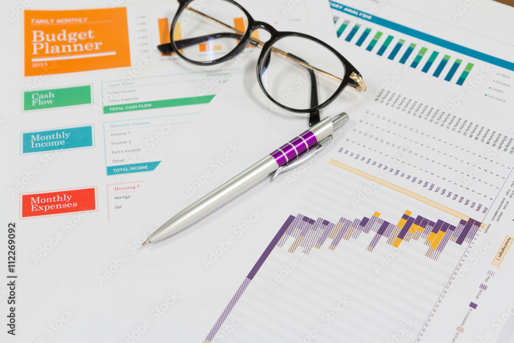 Analysis chart and paperwork on office table Analysis chart and paperwork on office table