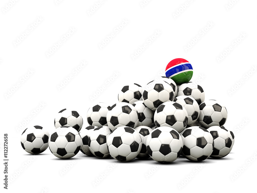 Pile of soccer balls with flag of gambia Pile of soccer balls with flag of gambia