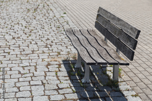 Wallpaper Mural empty wooden bench on street Torontodigital.ca