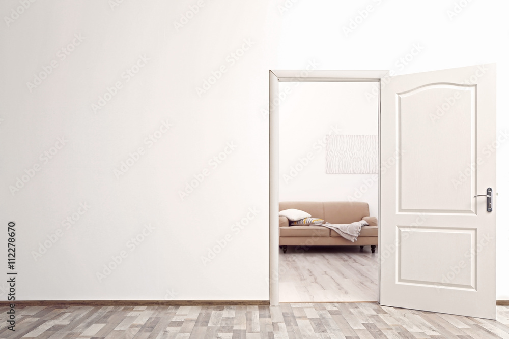 Fototapeta premium Open door in the room