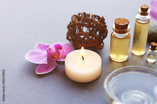 Beautiful composition of spa treatment on grey background