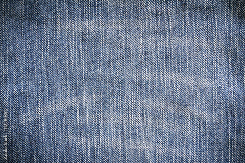 Denim texture. Denim background. Denim jeans. Denim fabric. Denim Surface. Blue jeans. Jeans texture. Jeans background. Jeans fabric. Jeans textile. jeans Surface. Jeans detail. Dark edged.