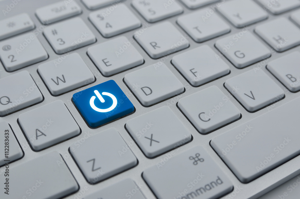 Power icon on modern computer keyboard button, Start up concept Power icon on modern computer keyboard button, Start up concept