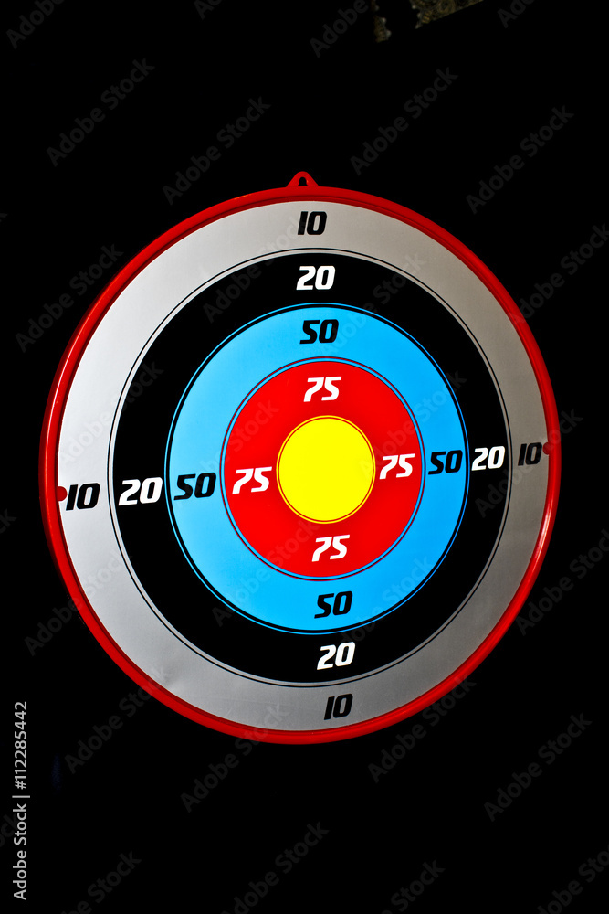 Plastic Target Board On Black Background Plastic Target Board On Black Background