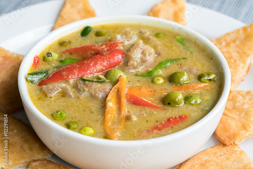 Green Beef Curry traditional Thai Food served with Roti Halal Food in Thailand 