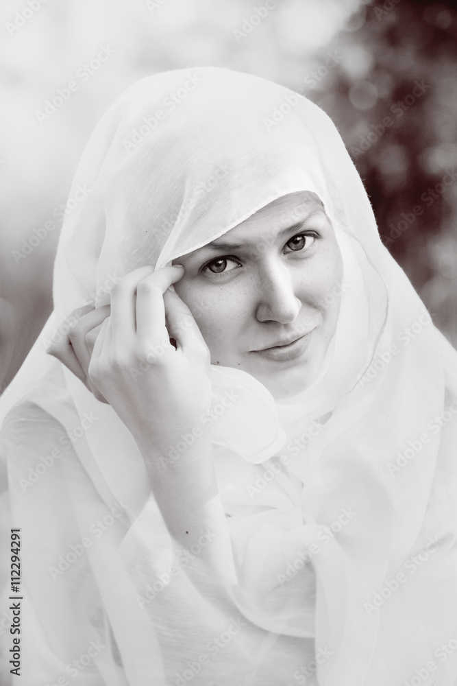 Portrait of a girl vested with a white cloth Portrait of a girl vested with a white cloth