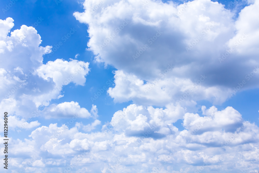 Obraz premium White clouds in the blue sky.