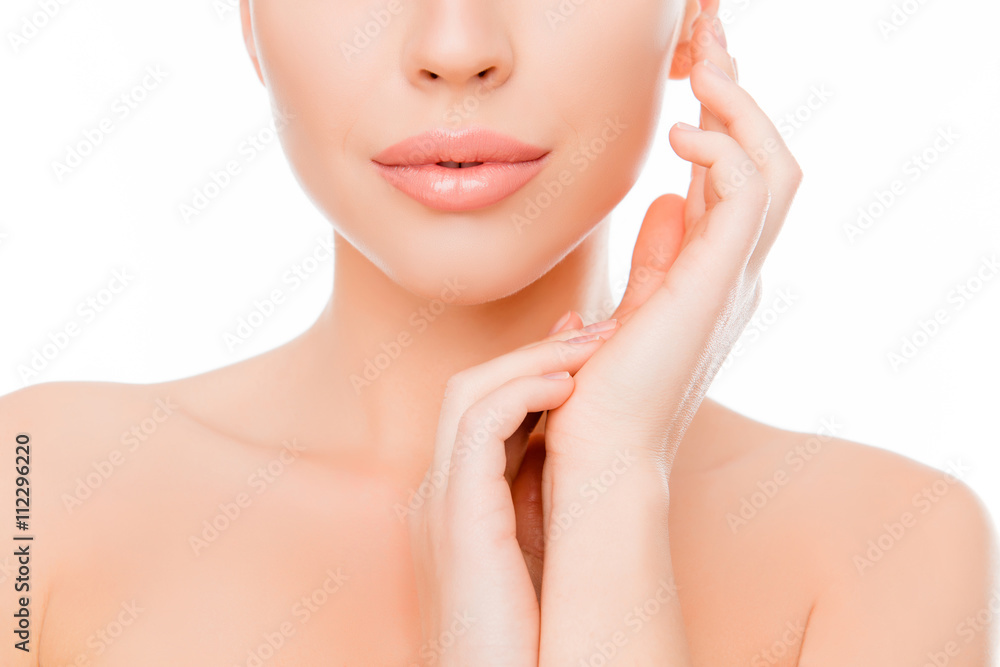 Close up portrait of calm young woman holding hands near face Close up portrait of calm young woman holding hands near face