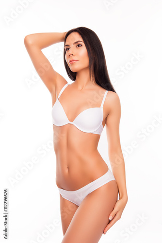 Pretty slim fit healthy woman in white underwear © deagreez