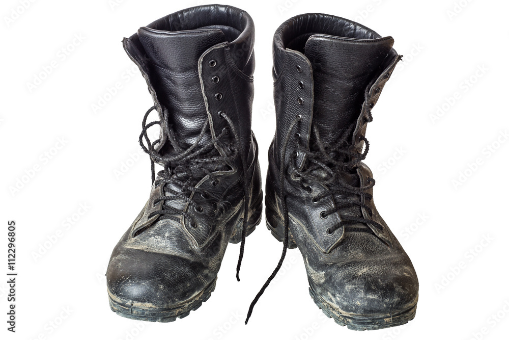Pair of old army boots. Isolated on white background.