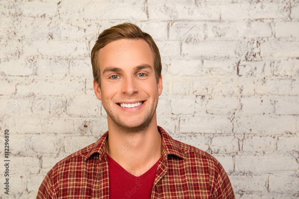 Portrait of cheerful happy man with beaming smile Portrait of cheerful happy man with beaming smile