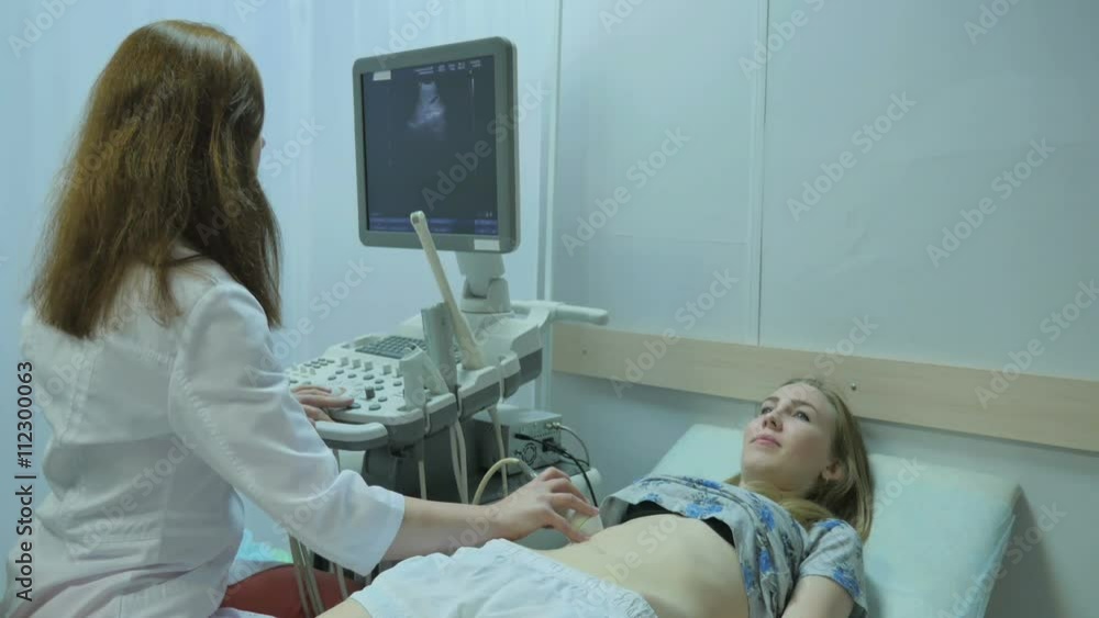 Doctor Compliting Ultrasound Doctor Compliting Ultrasound